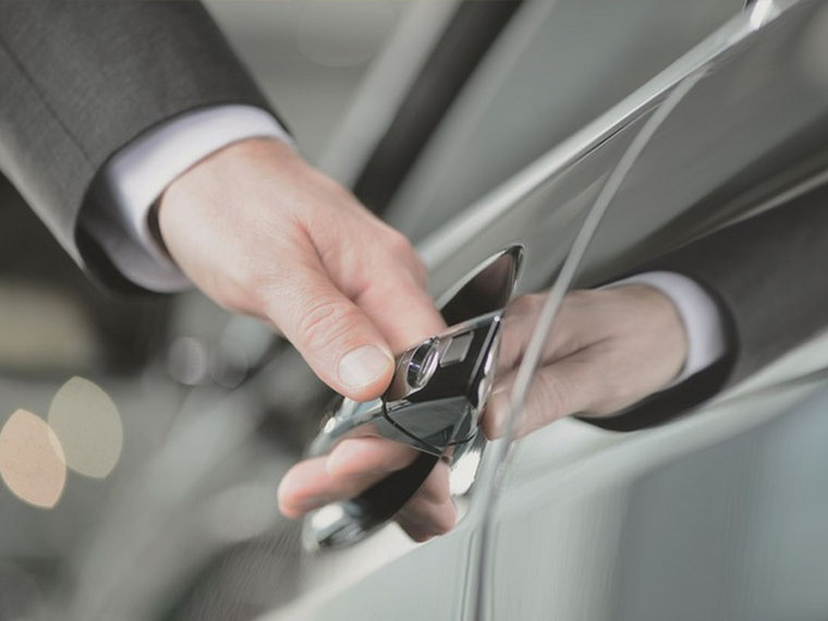 Man opening a car door provided by Addison Lee